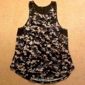 Lululemon flower top with partial see through back